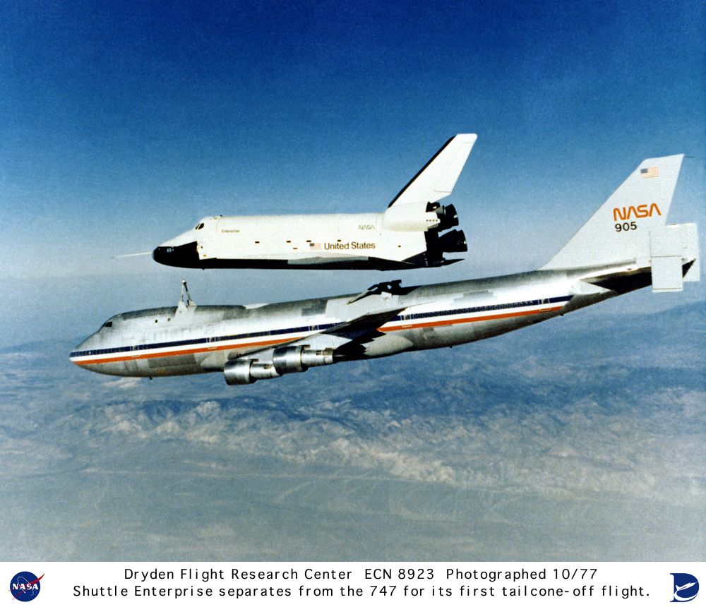 The Space Shuttle prototype Enterprise rises from NASA's 747 Shuttle Carrier Aircraft (SCA) to begin a powerless glide flight back to NASA's Dryden Flight Research Center, Edwards, California, on its fourth of the five free flights in the shuttle program's Approach and Landing Tests (ALT), 12 October 1977. The tests were carried out at Dryden to verify the aerodynamic and control characteristics of the orbiters in preparation for the first space mission with the orbiter Columbia in April 1981.
