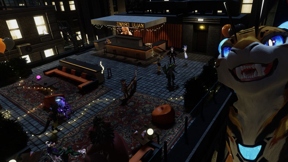 A photo of a rooftop in VRchat with several people hanging out