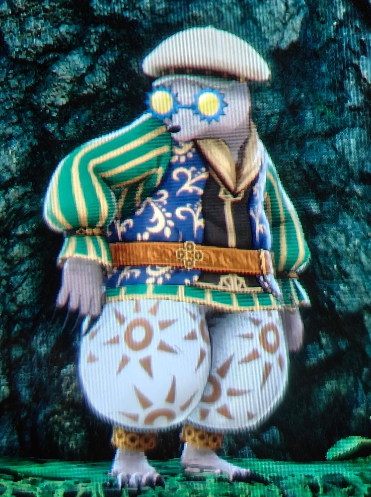 Screenshot du jeu Romancing Saga 2 représentant un personnage de la race des taupes que j'ai choisi pour être mon nouvel empereur.
Il est vêtu d'un sarouel bouffant, d'une verte pleine de motifs, d'un béret et de lunettes en forme de soleil avec les verres jaunes.
La définition même du swag ultime. 