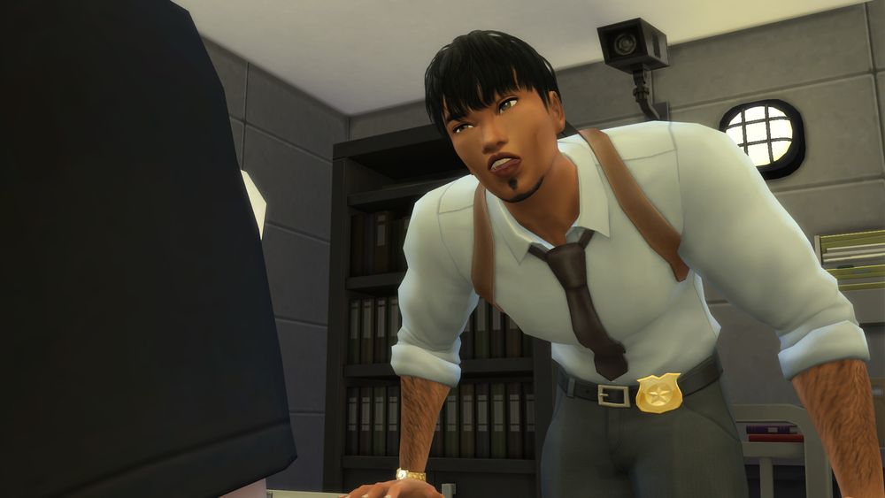 The Sims 4 screenshot.

A Sim leaning forward over a table while giving an intimidating look to another Sim (which has their shoulder visible). They're in an interrogation room.