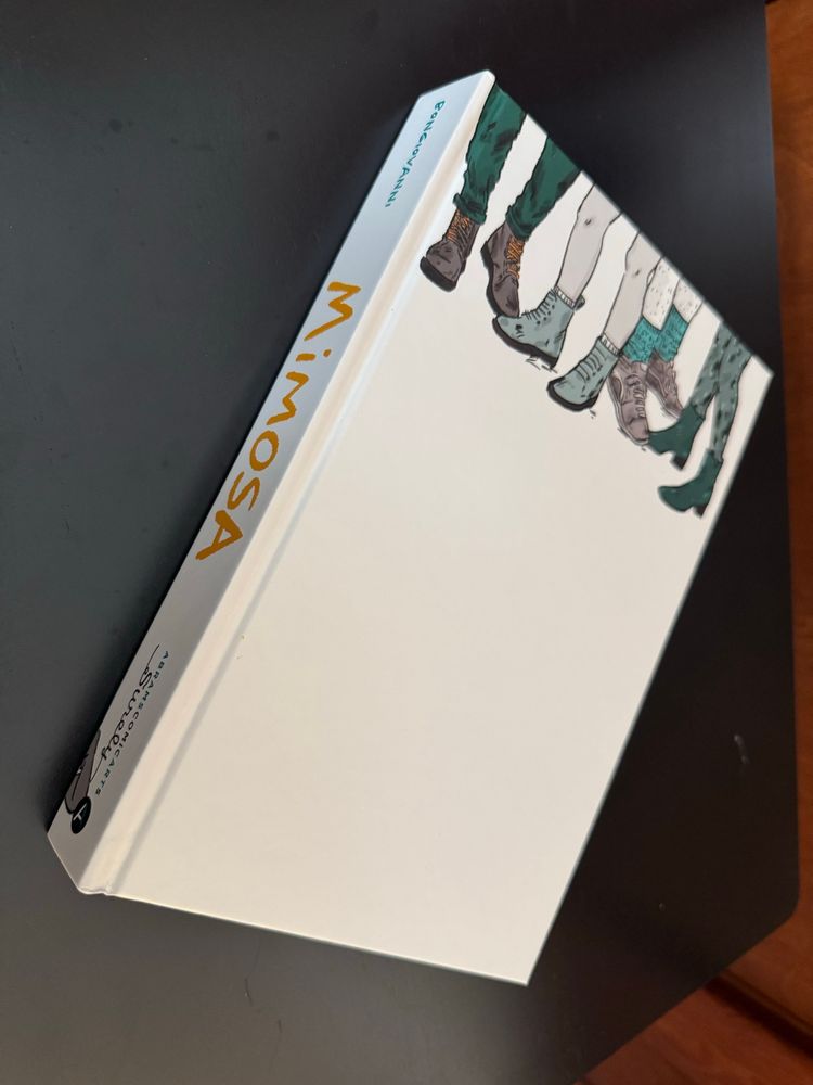 Same cover, spine showing.