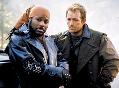 Malcolm Jamal Warner as Kurdy and Luke Perry as the title character in Jeremiah, in the 2002-2004 sci-fi show about a post-apocalyptic future, where a deadly virus has wiped out all but those who hadn't yet reached puberty.