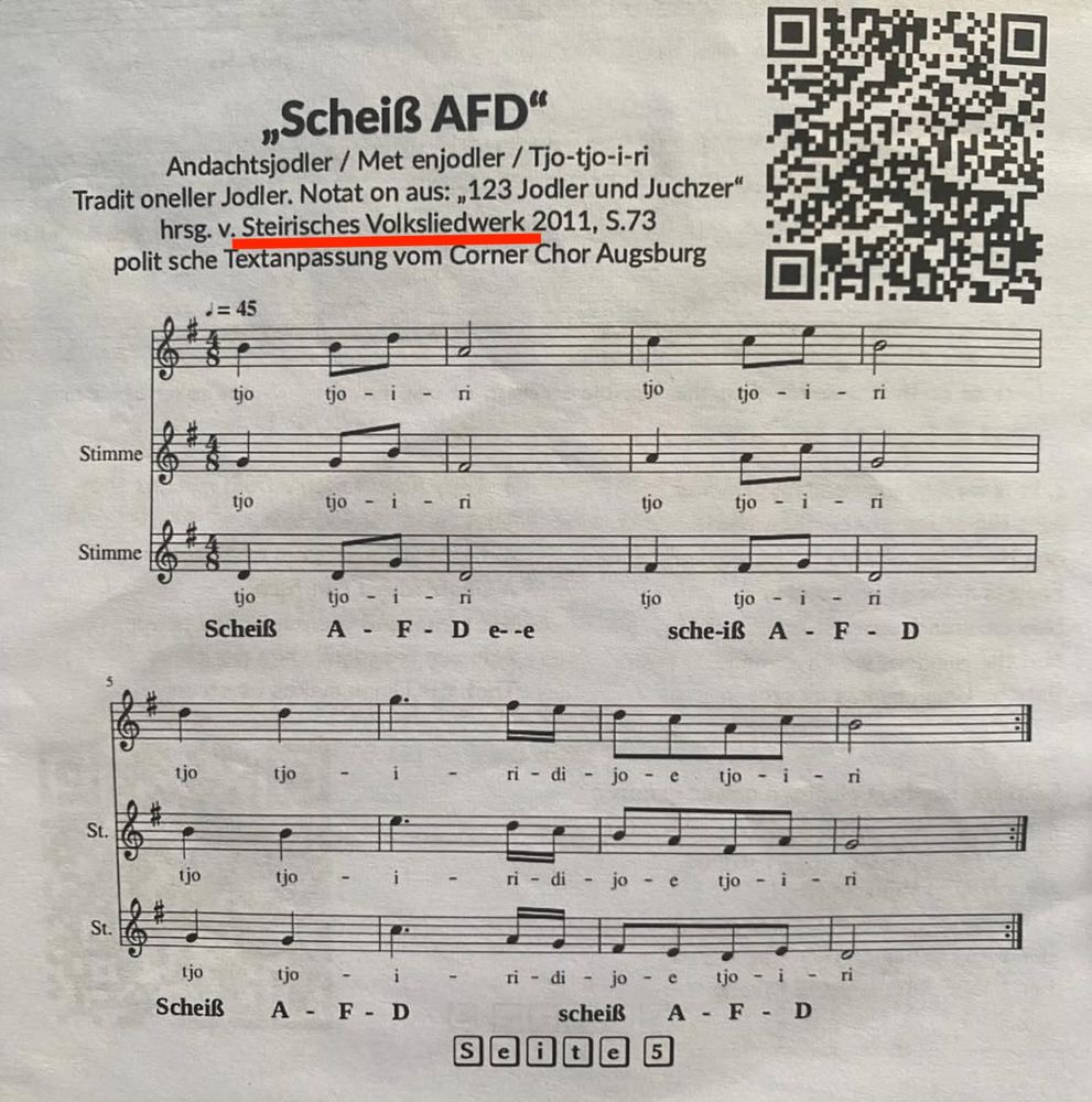 Noten des Andachtsjodlers, unterlegt mit dem Text "Scheiß AfD".
"Andachtsjodler / Met enjodler / Tjo-tjo-i-ri
Tradit oneller Jodler. Notat on aus: „123 Jodler und Juchzer" hrsg. v. Steirisches Volksliedwerk 2011, S.73 polit sche Textanpassung vom Corner Chor Augsburg"