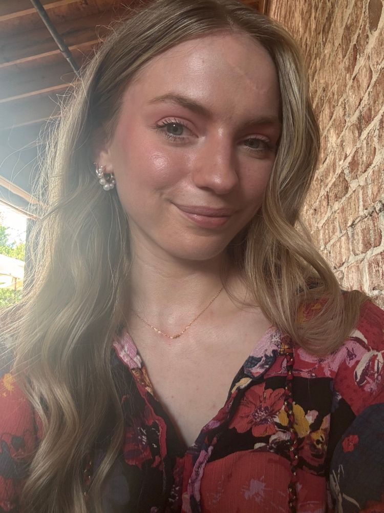 Image of the user wearing a red and navy dress