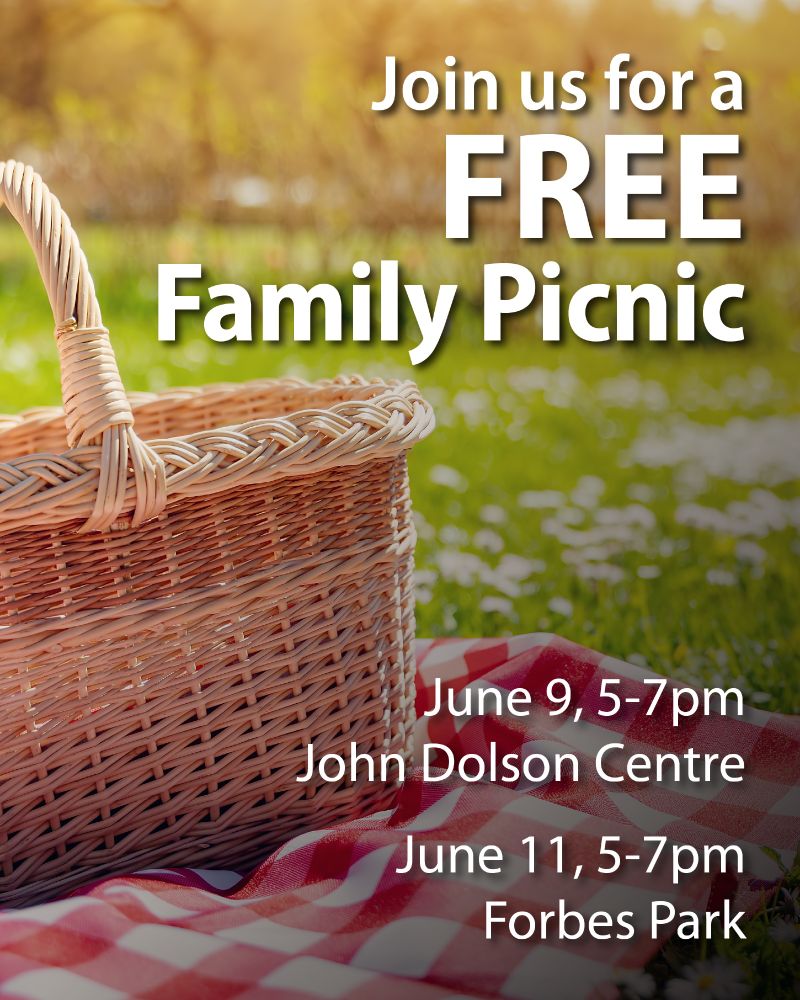 Advertisement for a free family picnic featuring a wicker picnic basket on a red and white checkered blanket, set in a sunny park. Event details include dates at June 9 and June 11 from 5-7 PM at John Dolson Centre and Forbes Park respectively.