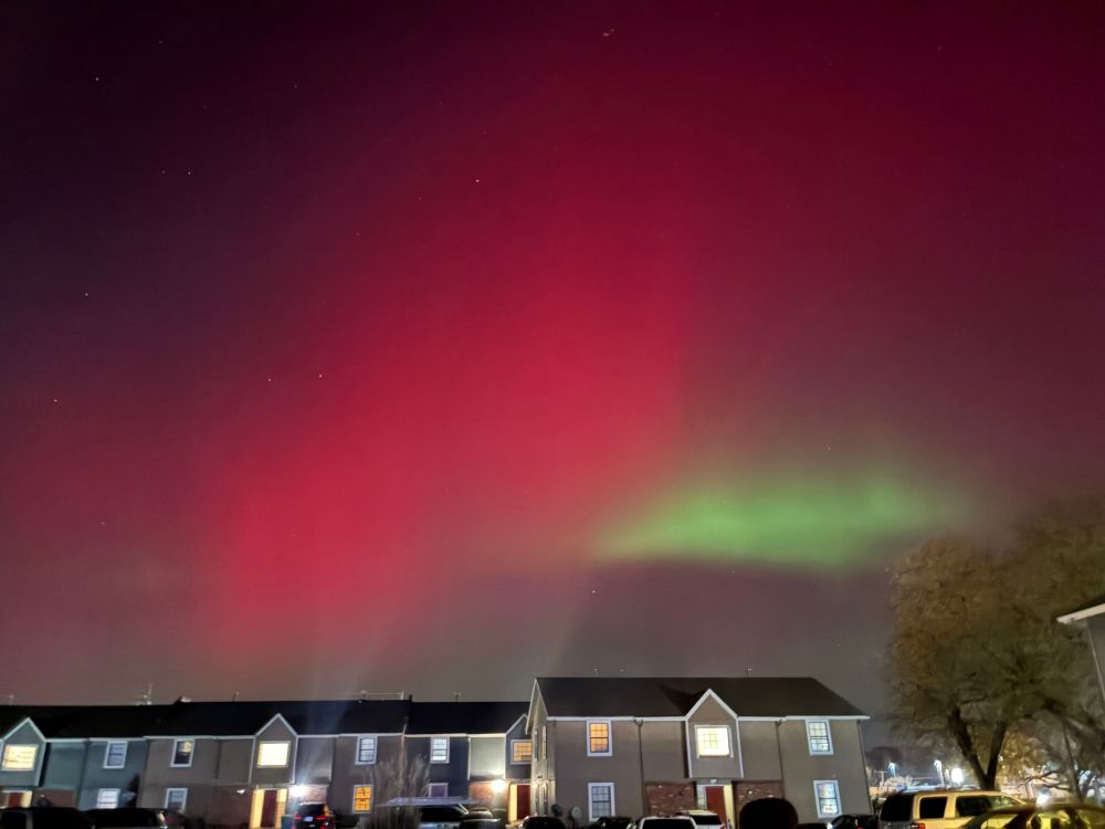 The northern lights over an apartment building 