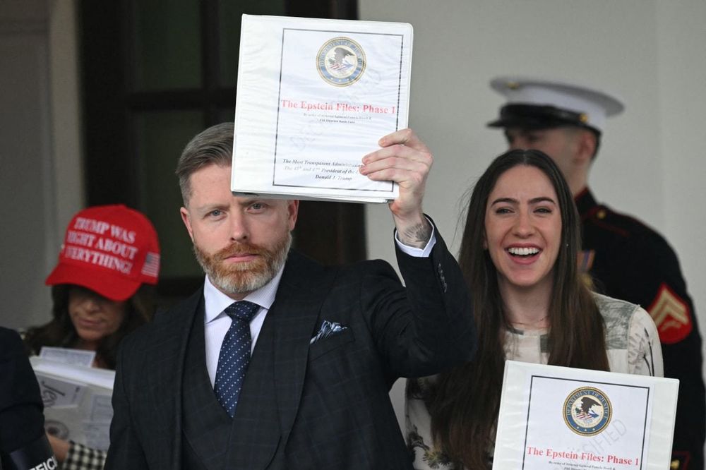 Binders given to MAGA effluencers with "EPSTEIN FILES - Phase 1" on them, on February 27, 2025.