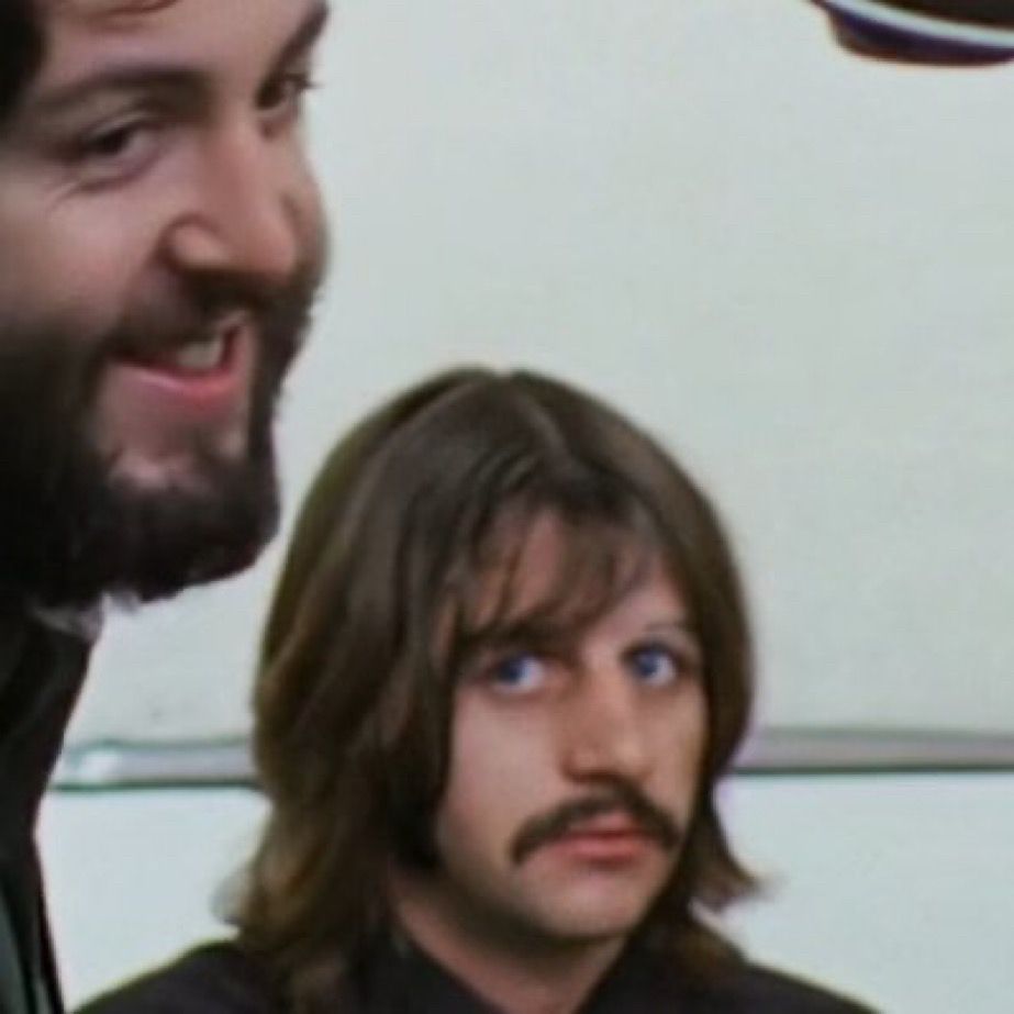 ringo starr looking at paul mccartney 