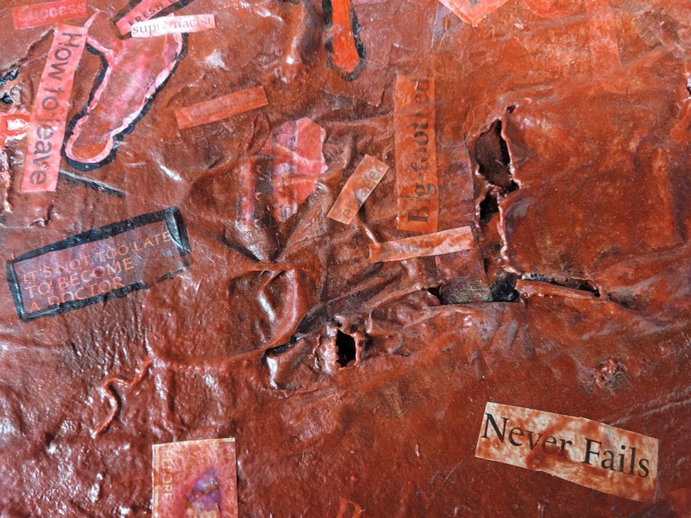 A detail shot from the piece. The magazine clippings read: "how to leave," "it's not too late to become a doctor," "enraged," "big-toothed," and "never fails."