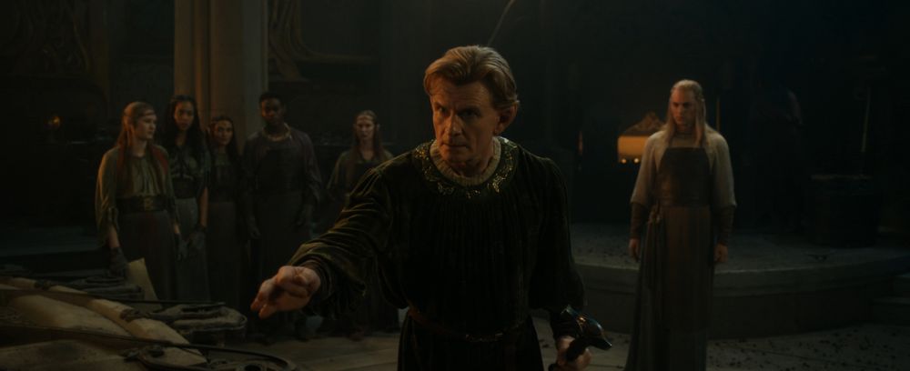 Celebrimbor approaches Mirdania (out of frame). Annatar and the elvensmiths observe in the background.