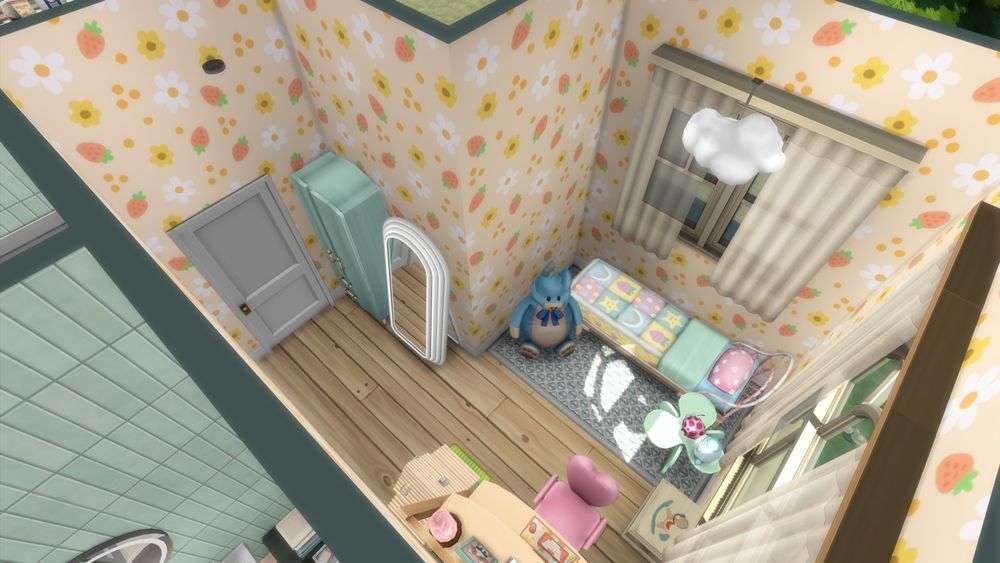 The kids room with strawberry and flower wallpaper. The bed has strawberries and rainbows on it.