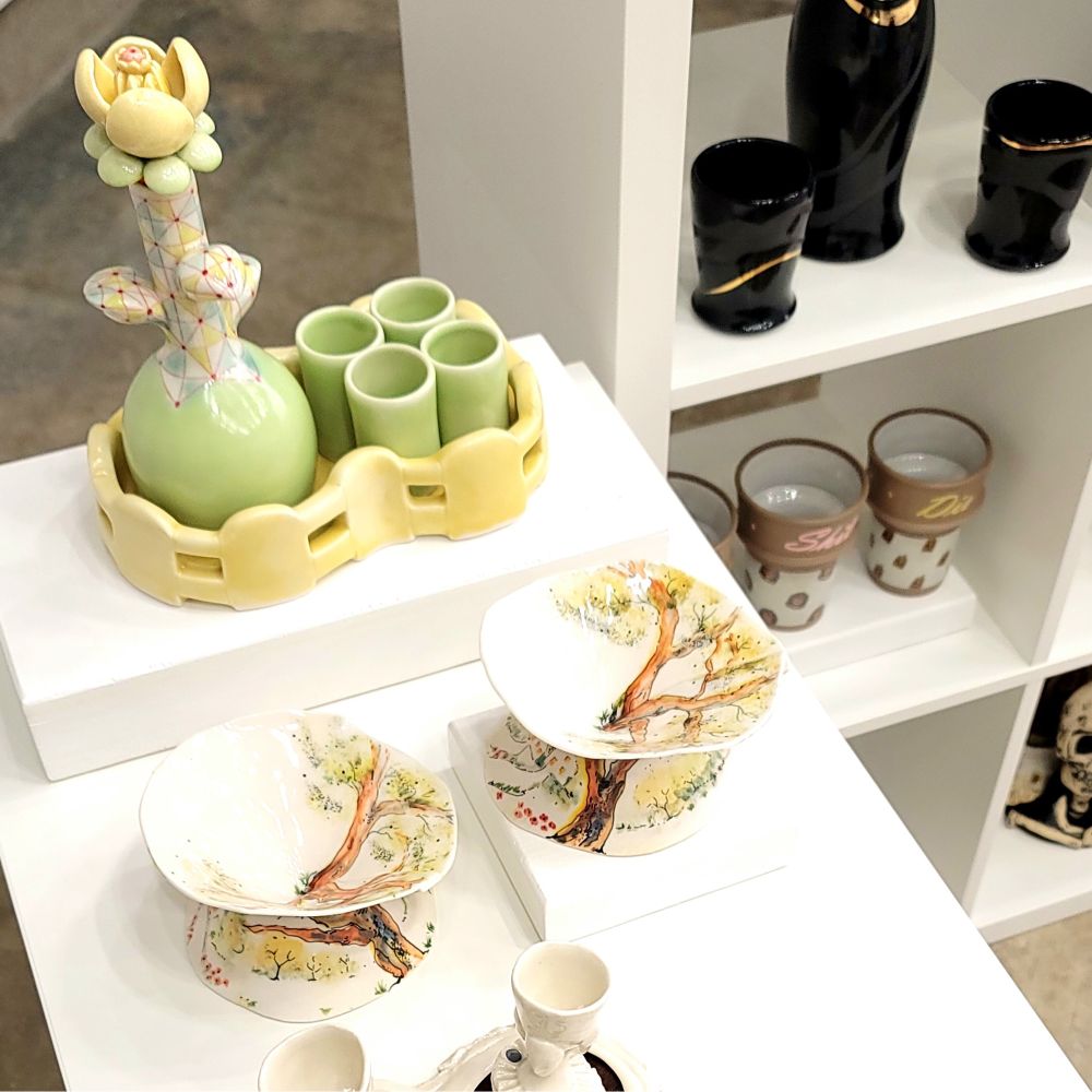 An aerial view of variety of liquor sets in the show, Last Call X at Companion Gallery.