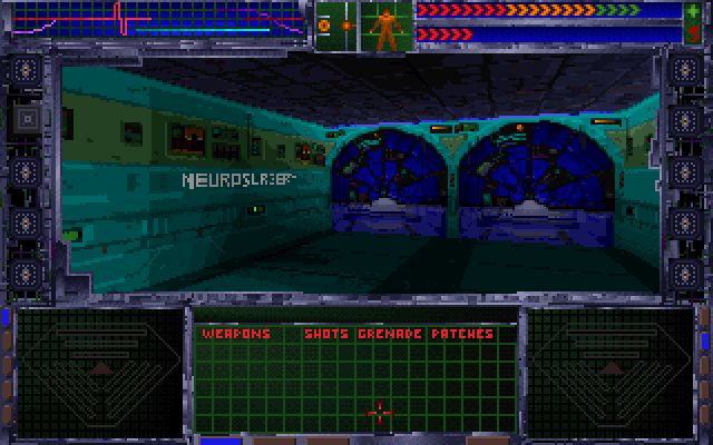 System Shock (1996): About 60% of the screen is taken up by a pixel-art HUD, with a wide frame in the center showing a pixelated rectangular room in lurid teal and blue.