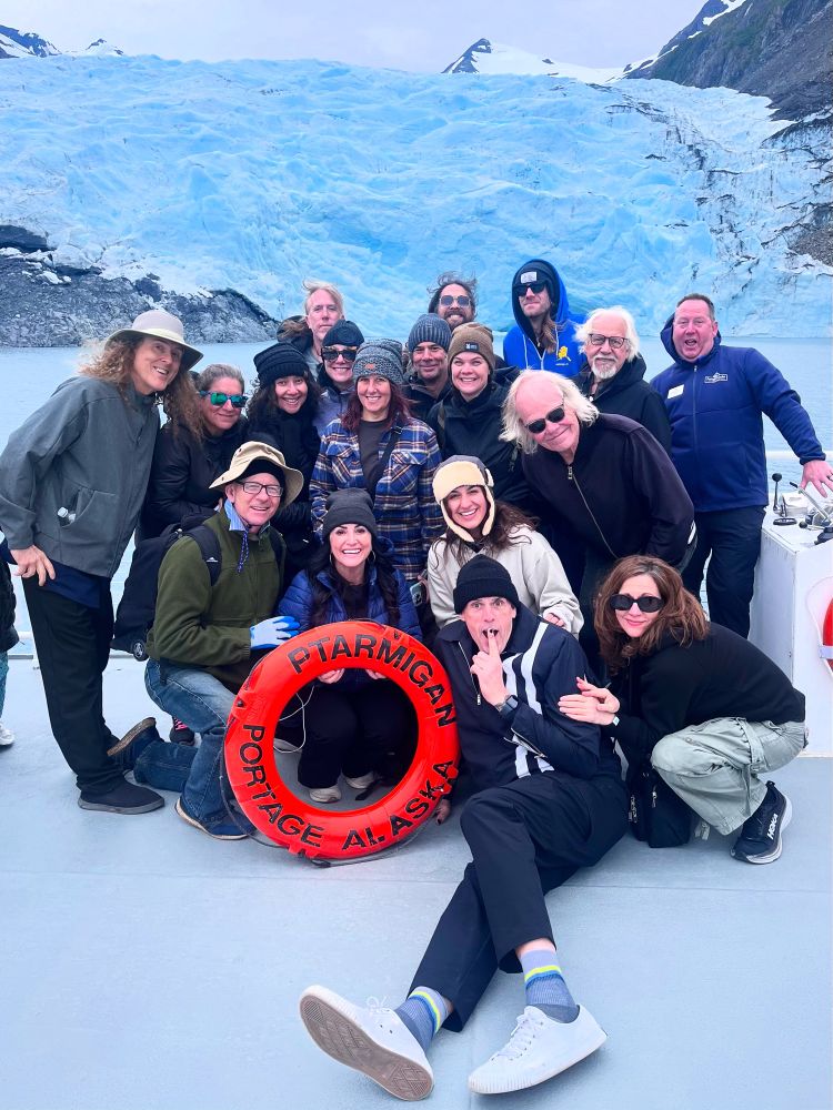 Al poses with his crew in front of the Portage Glacier. 