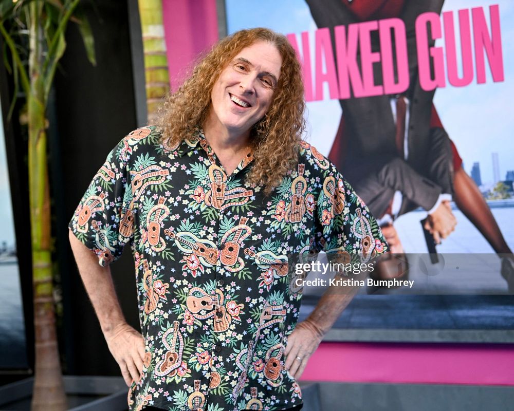 Al poses on the red carpet at the Naked Gun premiere