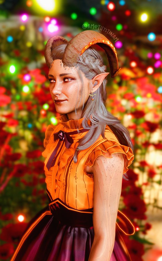 Gnowee, smiling, wearing an orange and burgundy dress with bows, surrounded by colorful lights and flowers