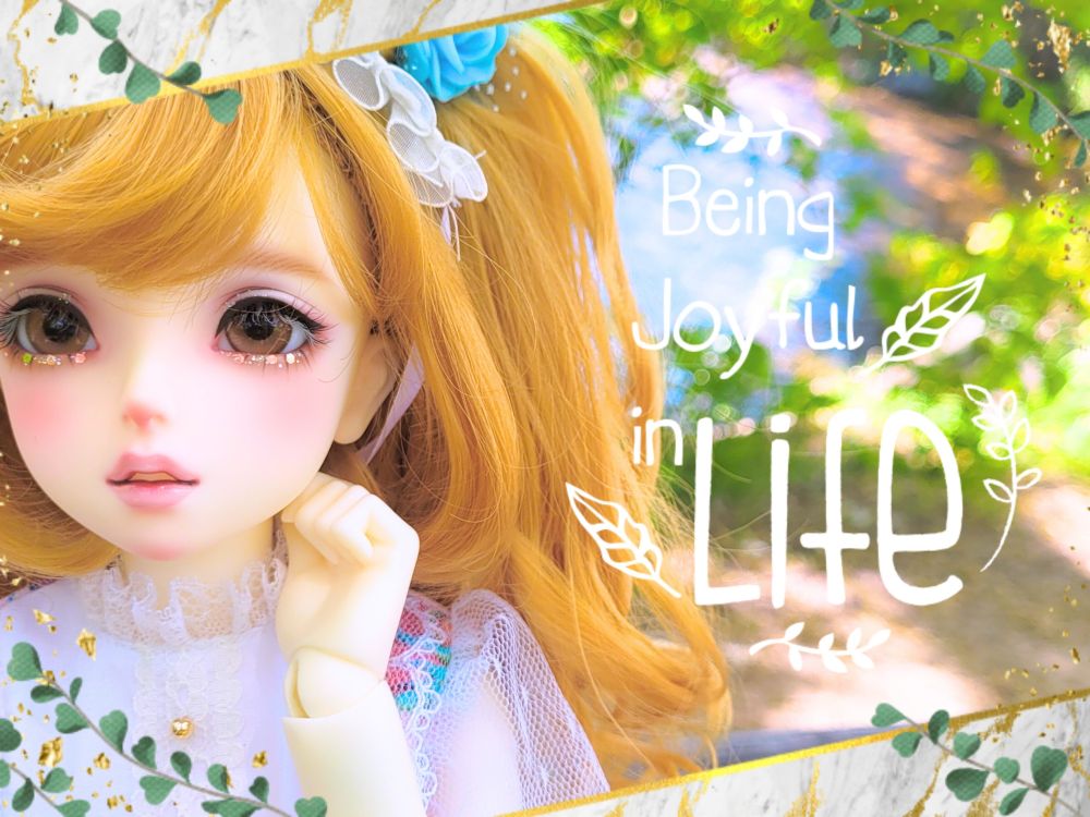 Photo of a Volks Yumepi, edited with a gold and marble frame and the worda "Being Joyful in Life" purely for fun and aesthetics