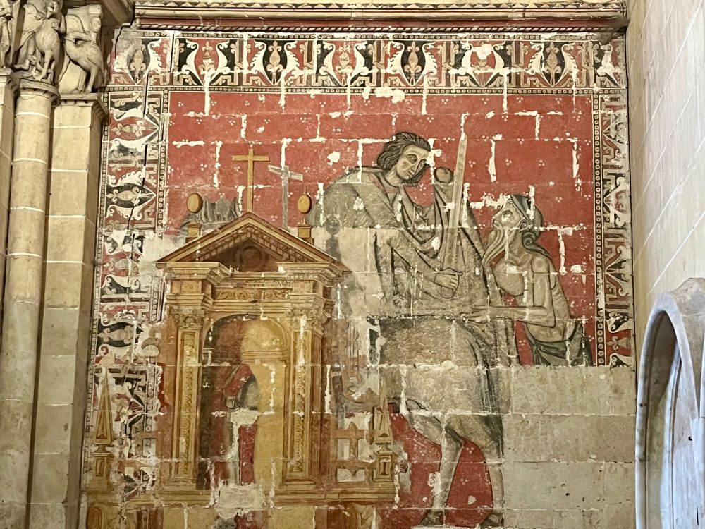 Medieval wall painting of St Martin and a beggar 