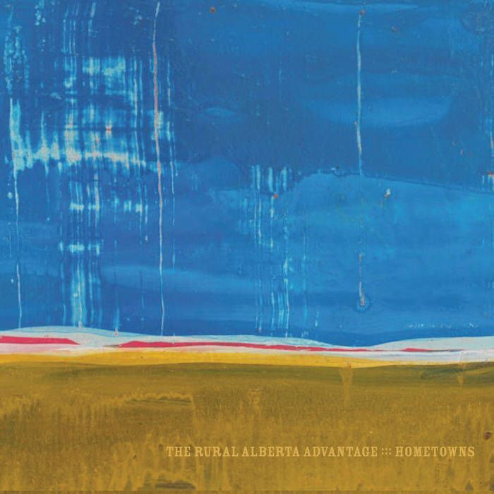 The cover of Rural Alberta Advantage’s album Hometowns which has a painting of a prairie field with a large sky 