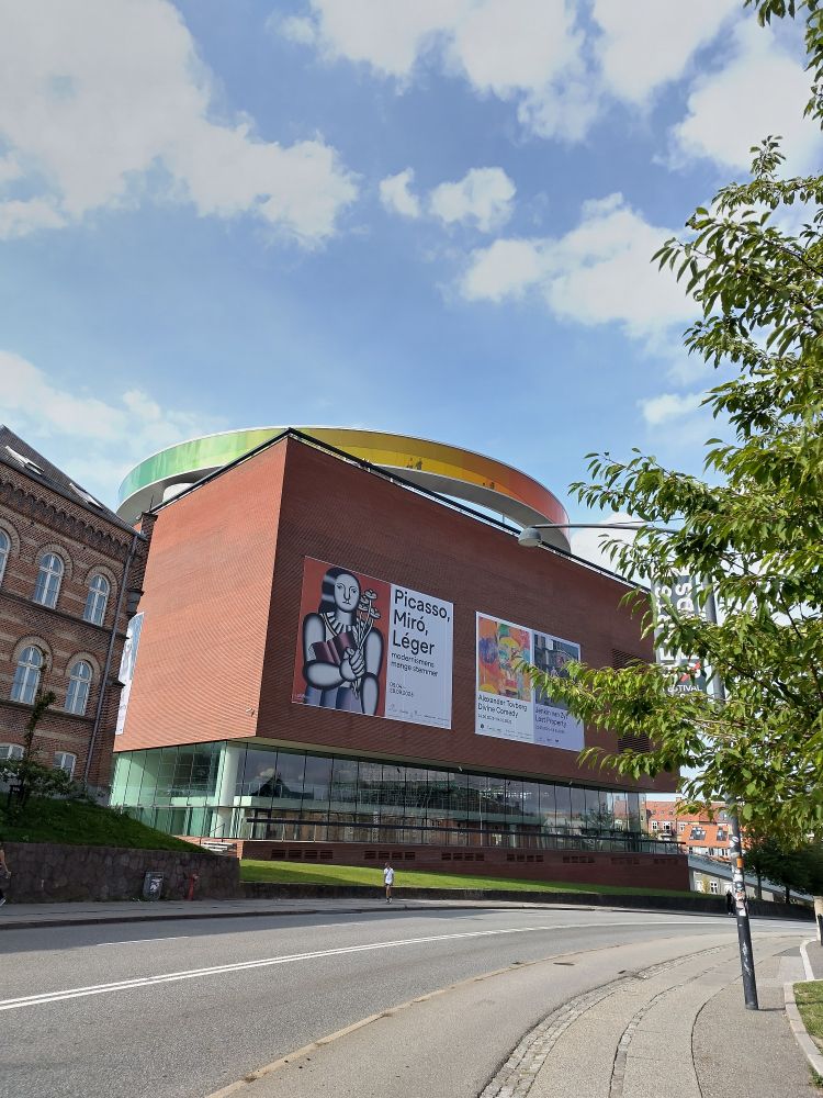 The Aros museum in Aarhus with a rainbow pathway on the roof
