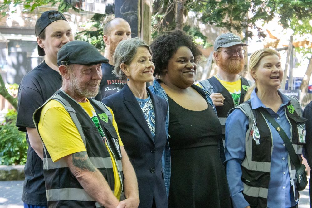 Council President Nelson poses for a photo with attendees of her press conference. 