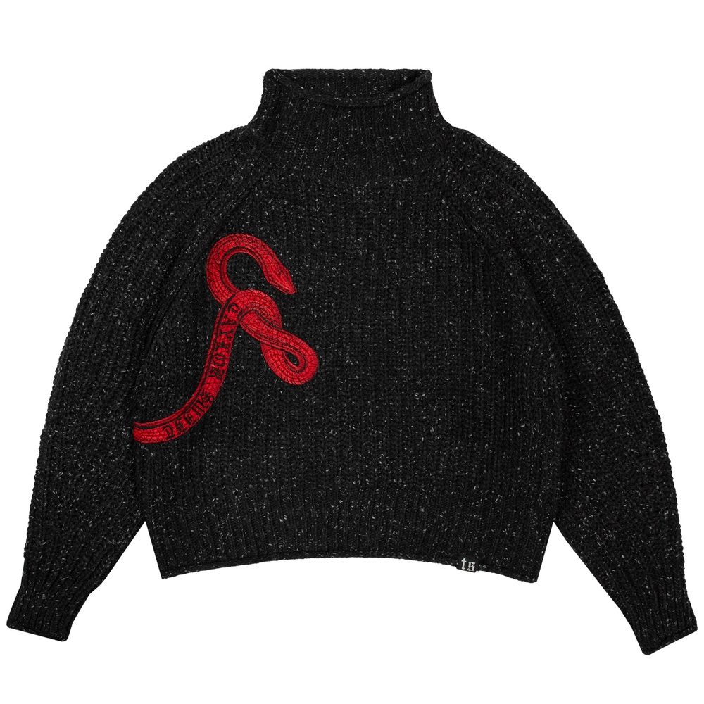 Taylor Swift black sweater merch item with red snake on the front with the words ‘Taylor Swift’ on the red snake. 