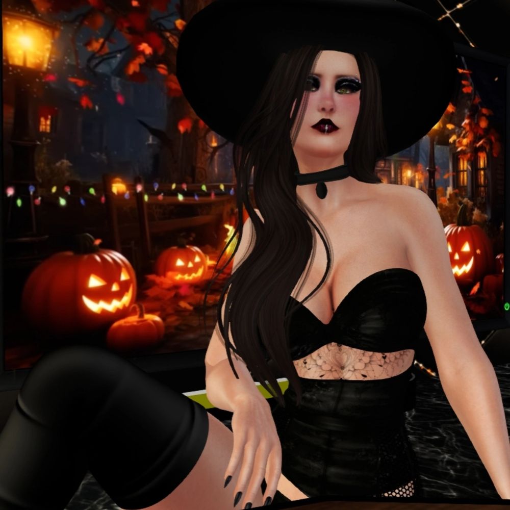 A female avatar sitting in a sexy witch costume with a Halloween background.