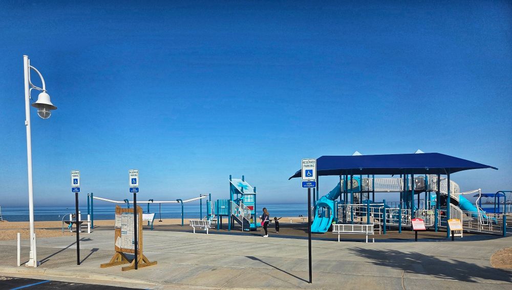 Silver Beach Park in St. Joseph, Michigan. Children's play area in foreground, Lake Michigan in background.