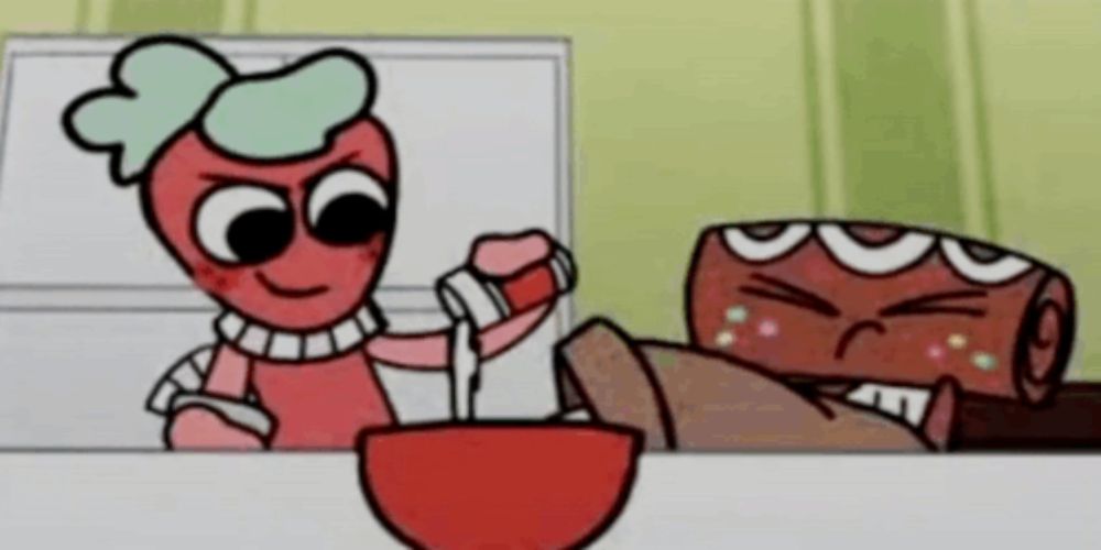 a cartoon character is sitting at a table with a bowl of food and a gingerbread man .