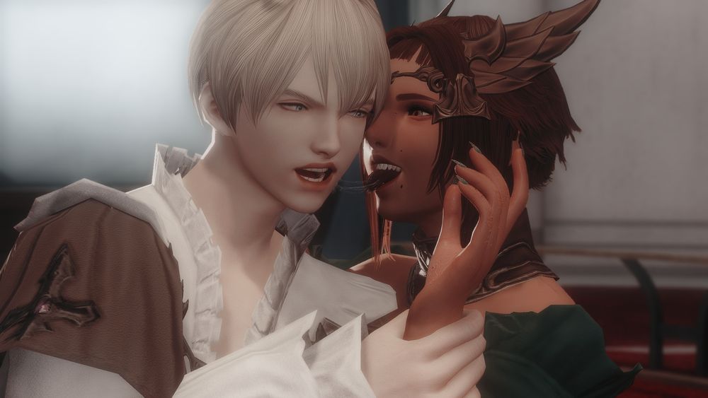 There are two figures pictured. On the left is Ramza bas Lexentale and on the right is my oc, Orpheus Royce. Orpheus is getting close and (while not shown) is pulling Ramza's head closer to her's. She has a taunting expression with her tongue out. Covered in saliva which is stringing from Ramza's cheek. Ramza is staring at her with disgust at her action. His hand grabbing onto Orph's hand that is visible in the shot.