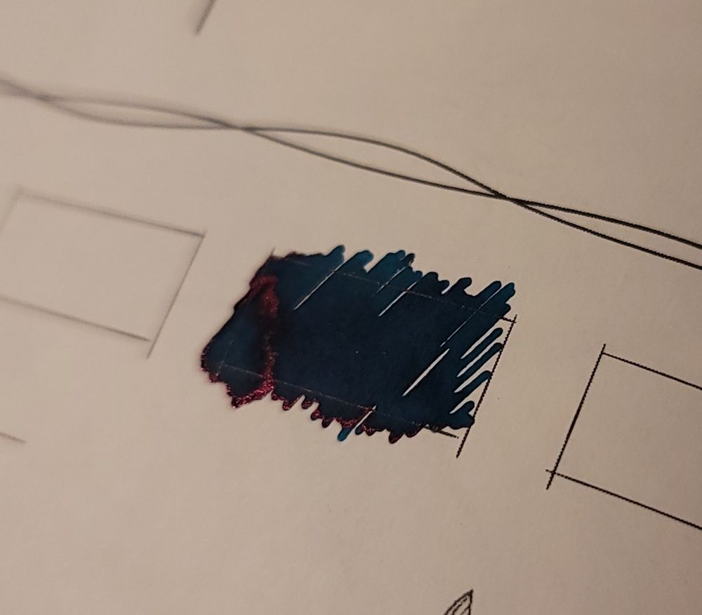 Wearingeul call of the Cthulhu ink scribble - deep teal with a dark red/pink sheen
