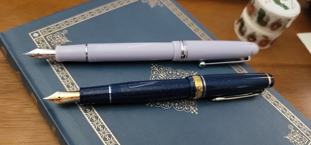New fountain pens! Pilot custom 74 in Lavender Fog 
Sailor pro slim shikiori fairy tale series in Vega (sparkly dark blue)