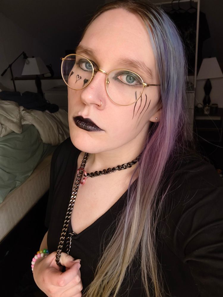 picture of me in makeup and black lipstick 