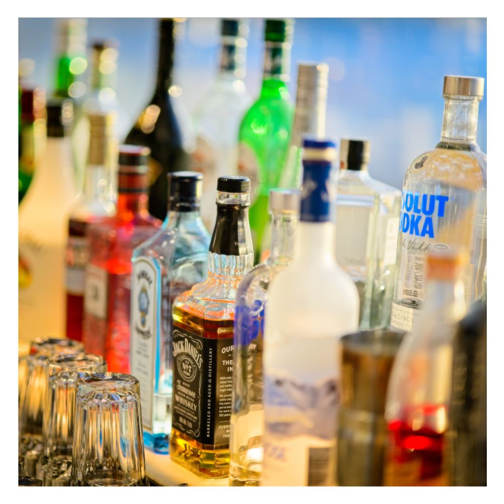 Bottles in a bar in the late afternoon sun