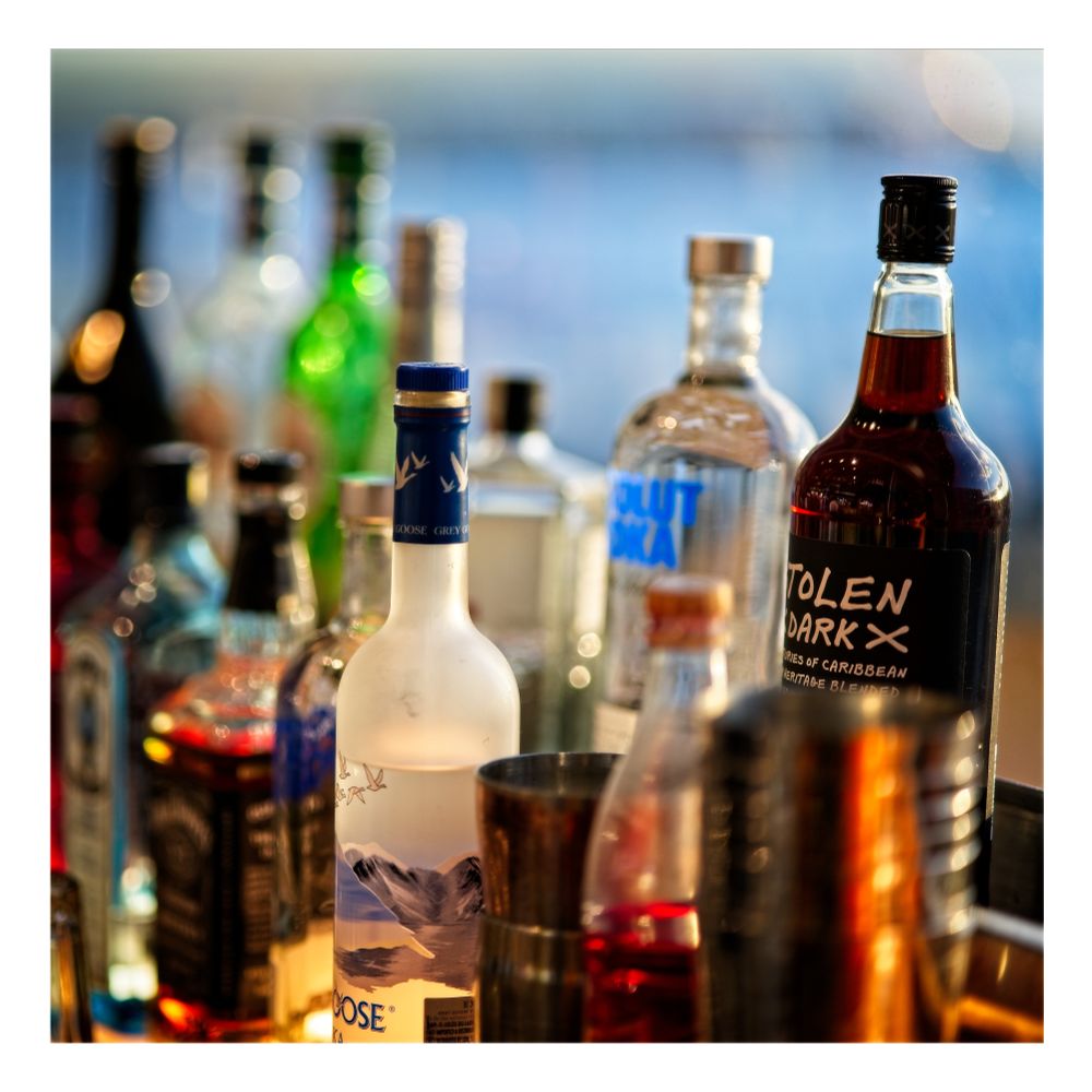 Bottles in a bar in the late afternoon sun