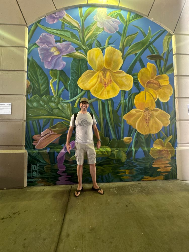 Me in front of the mural