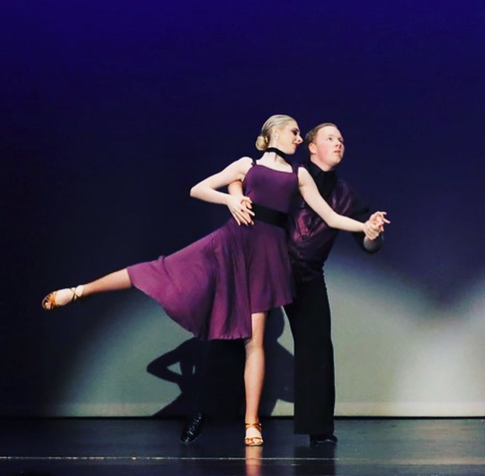 uuuh more dancing, these poses are hard to describe i'm so sorry. i'm lifting my leg up half way and my dance partner is behind me