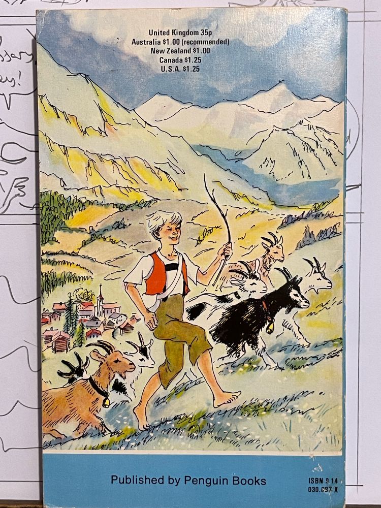 Back cover of Puffin book, Heidi, showing off colourfully illustrated mountain landscape and by with goats.