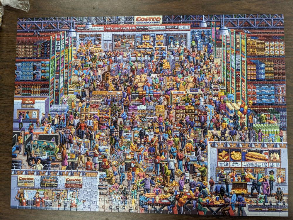 Photo of a completed puzzle showing the inside of a Costco store