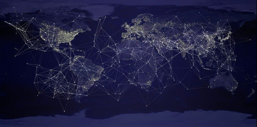 Image thanks to Pete Linforth made freely available by Pixabay. It shows a dark blue map with lights on all over the world and lines joining up the different areas. The idea is to represent both the international network of researchers researching this theme and the concept of changing dynamics of global virtual collaboration in the digital age. 