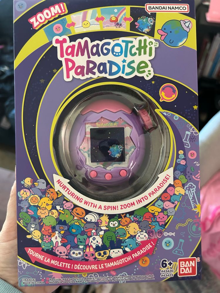 A tamagotchi paradise purple sky 