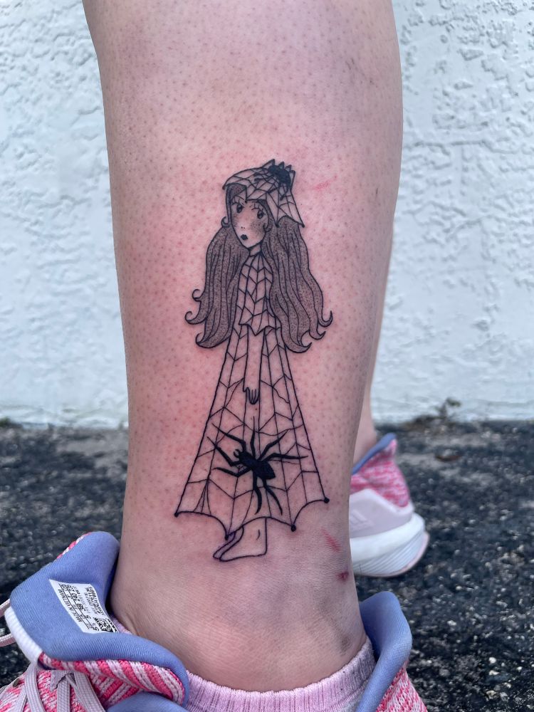 Black and white tattoo of a cartoon girl with a spiderweb dress