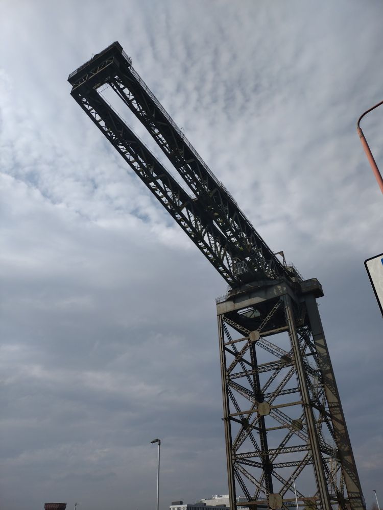 A large industrial crane next to the river Clyde 