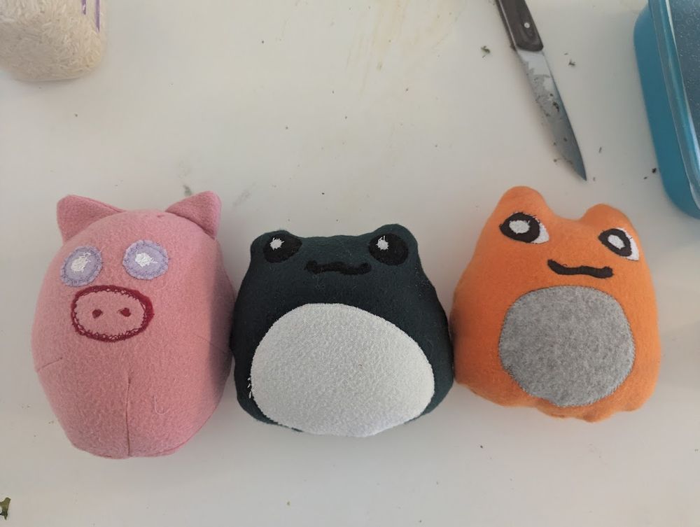 Plushie toys I've been making - a pig, frog and cat.