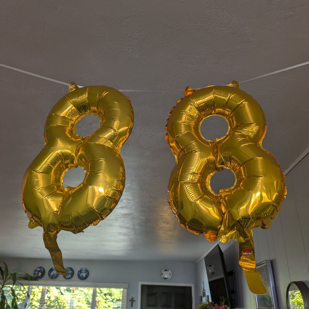 Gold balloons that are the number 88