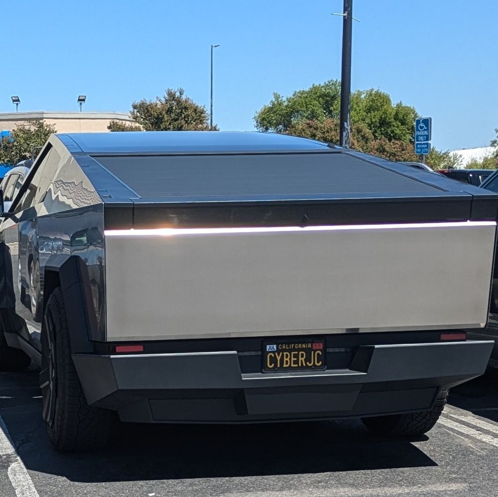 A cybertruck with the personalized license plate 