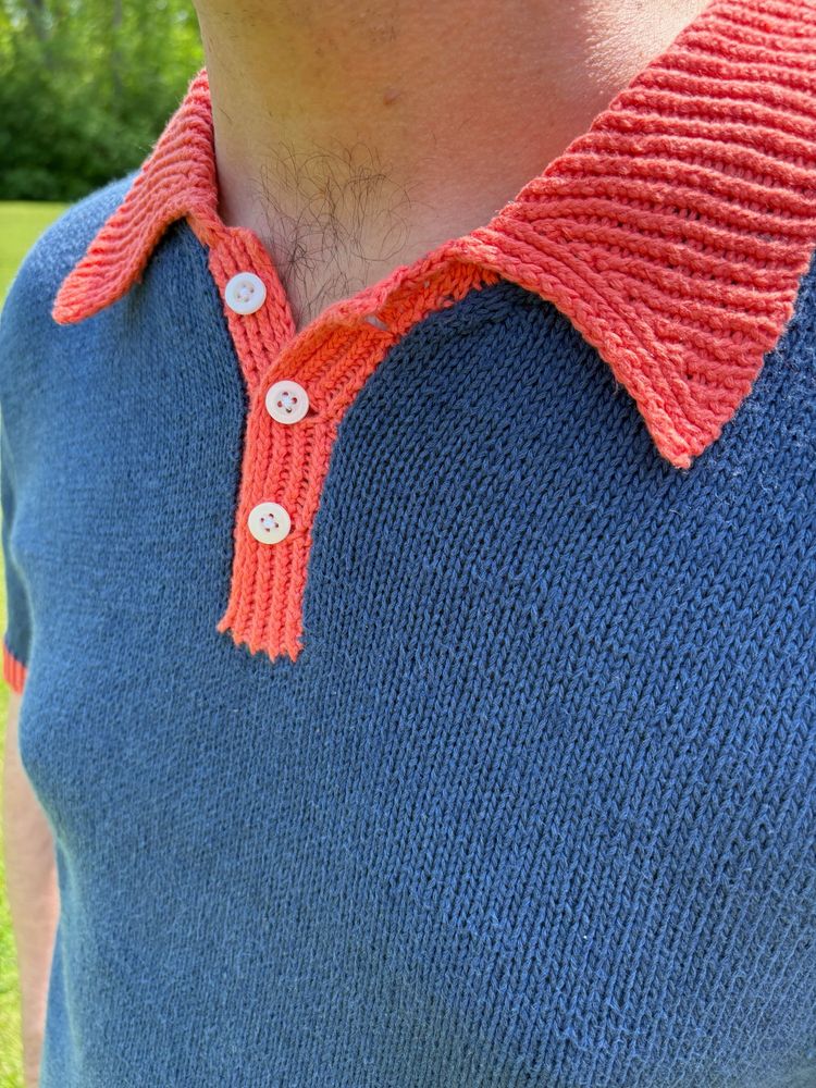 A close up of a polo placket and collar in a cotton yarn