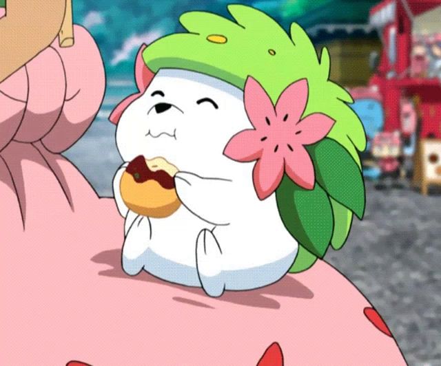 a cartoon character with a flower in its hair is eating a doughnut