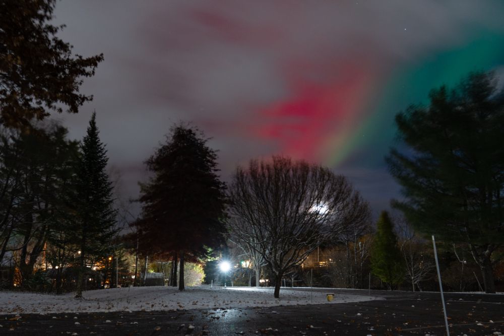 Northern lights breaking through clouds in Augusta, ME. 