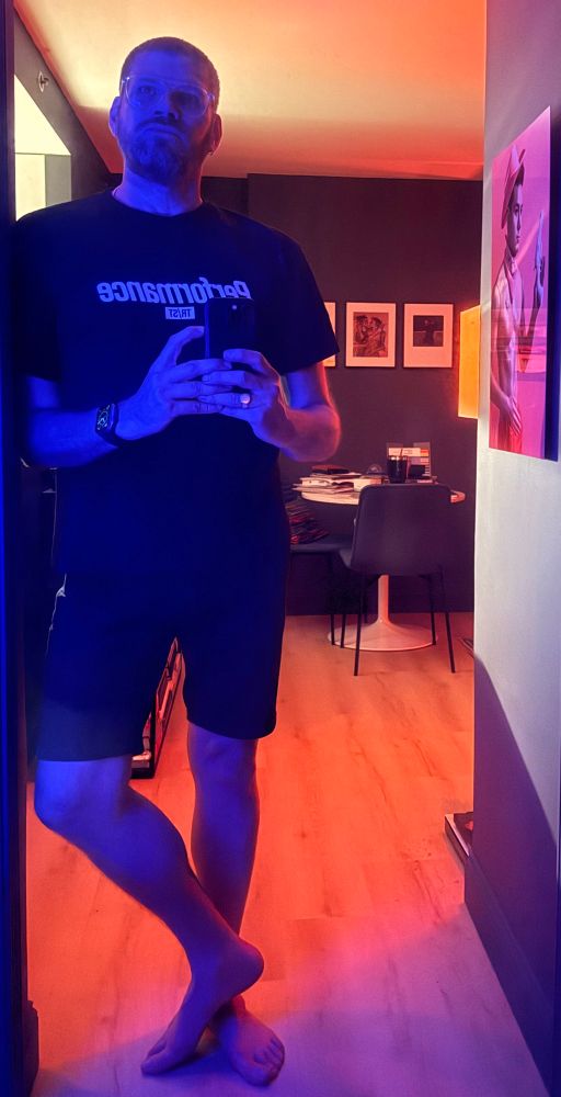 Me standing in apartment in mood lighting
